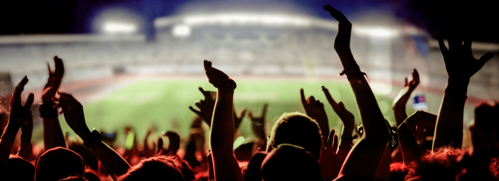 afición en un estadio para ilustrar Cómo transmitir emoción con gráficos en estadios deportivos.